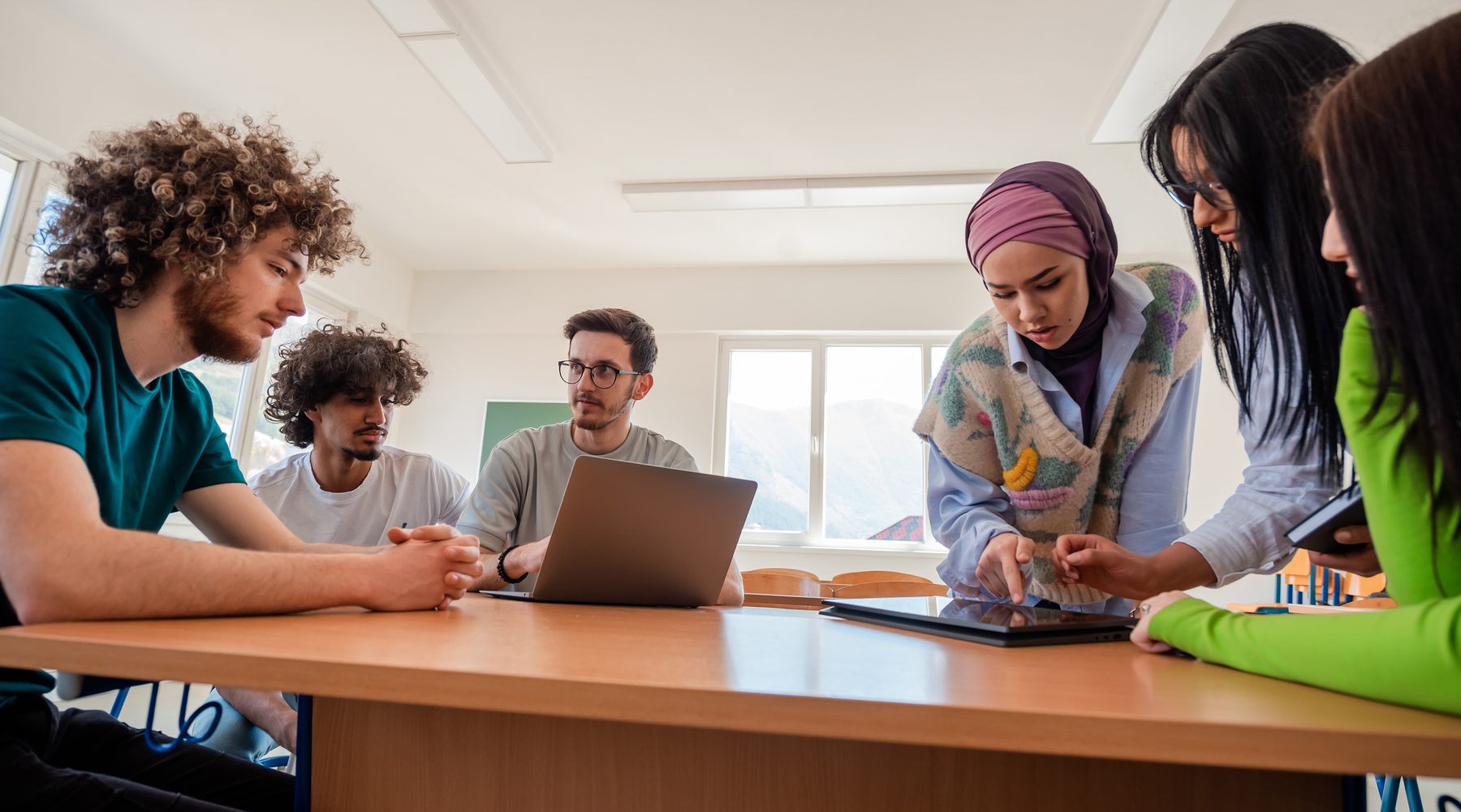 Diverse students thinking through academic work